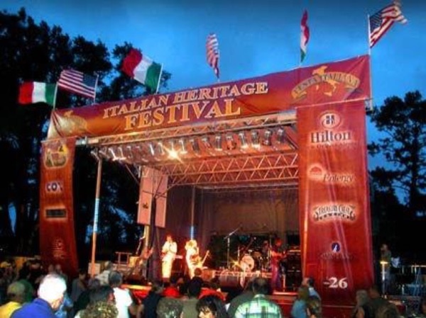 Stageline stage at an Italian Heritage Festival at dusk